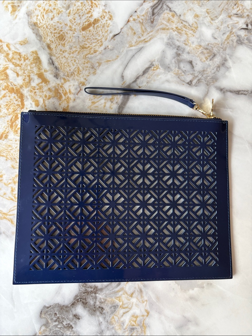 Tory Burch navy blue "Lace Cut" limited edition wristlet